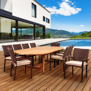 Go to store & view more images Arango 11 Piece Teak Dining Set with Sunbrella Cushions by Beachcrest Home