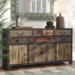 Go to store & view more images World Menagerie Moultry 7 Drawer 4 Door Sideboard