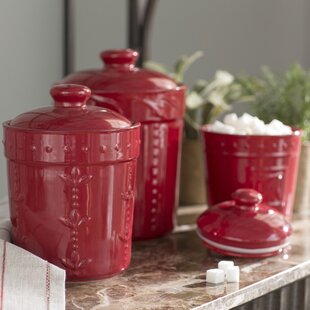 red canister set with metal base
