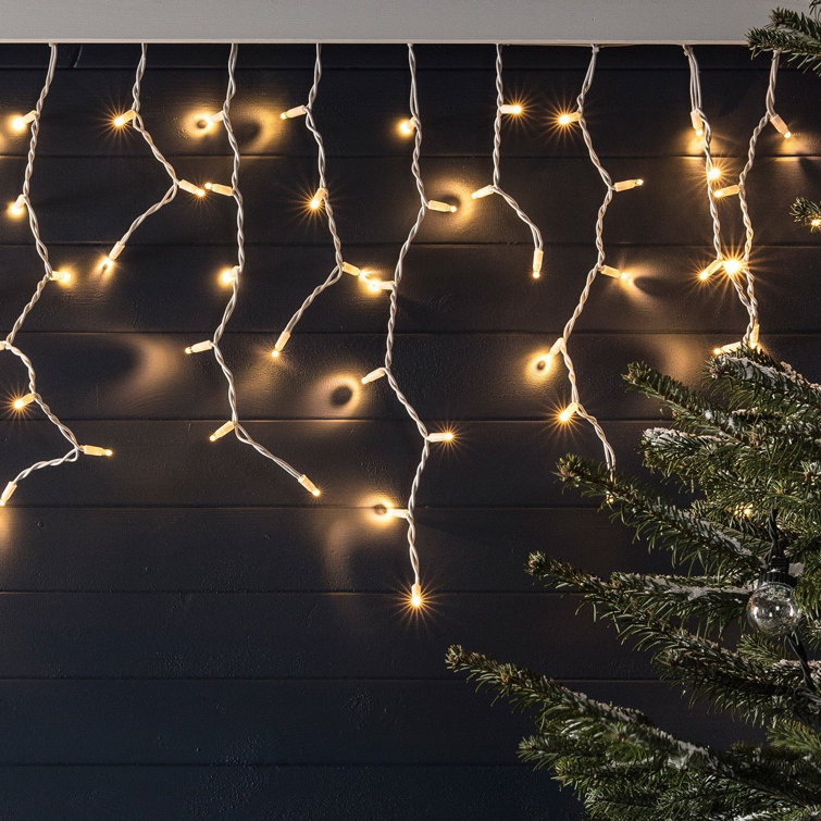 The Seasonal Aisle 960 Warm White LED Snowing Icicle Lights Wayfair.co.uk