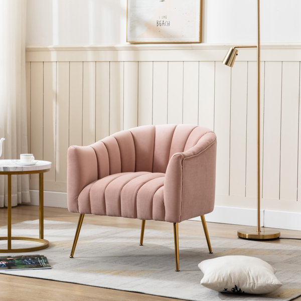 blush pink accent chair with gold legs