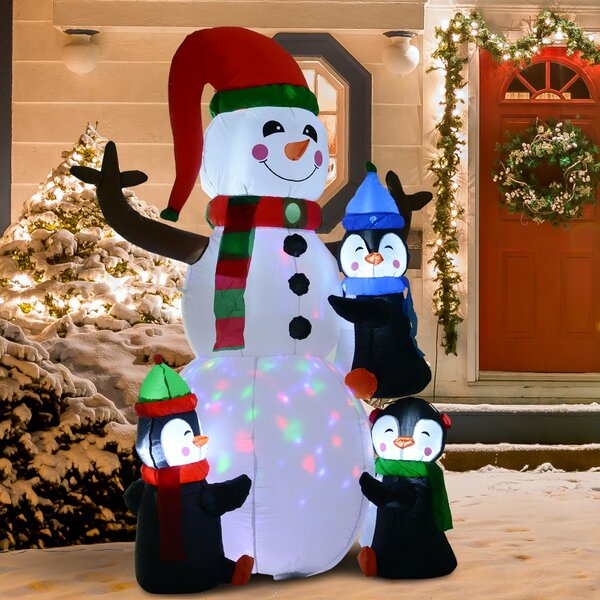 Santa Getting A Wedgie From Penguin Christmas Inflatable 4 ft 