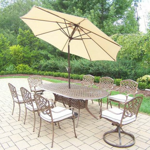 Go to store & view more images Mississippi 9 Piece Dining Set with Cushions by Oakland Living