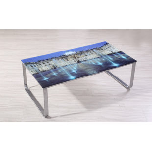 Go to store & view more images Ebern Designs Shelia Scene Decor Coffee Table