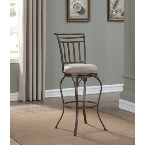 Jannie Swivel Round Bar Stool by Fleur De Lis Li..
