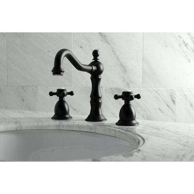 kingston brass heritage two-handle 3-hole deck mount widespread bathroom faucet with brass pop-up drain