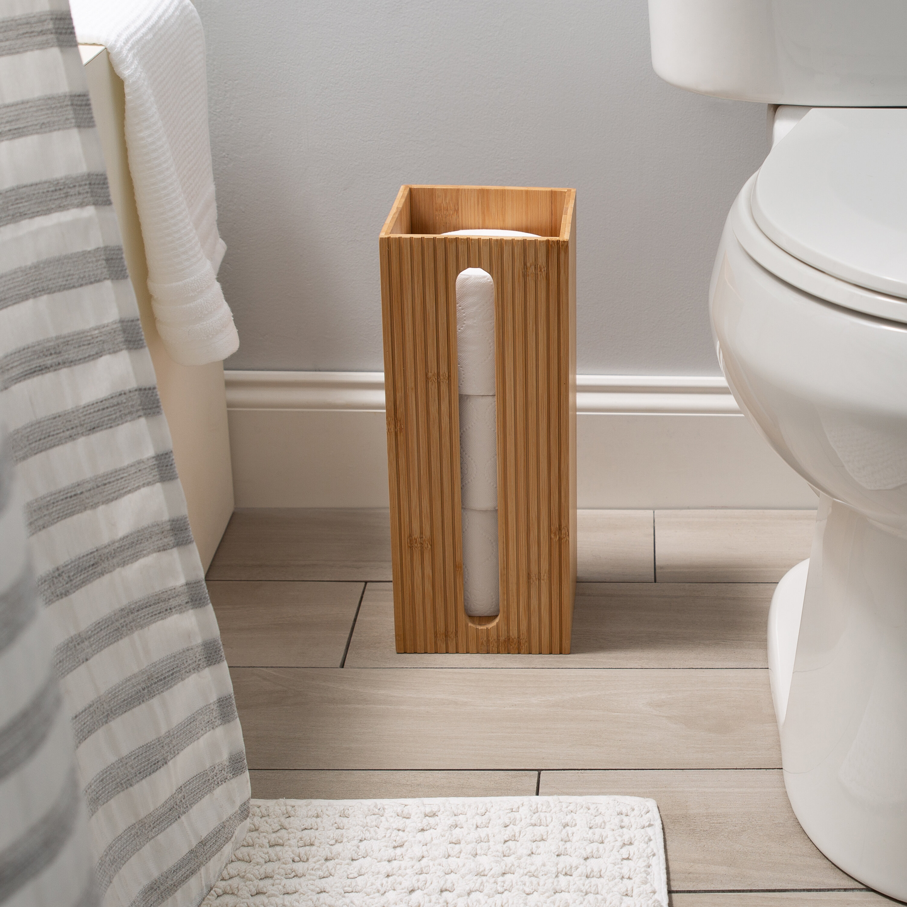 Bamboo Toilet Paper Holder perfect for toilet paper storage or general bathroom storage a freestanding toilet paper holder handmade from biodegradable bamboo 