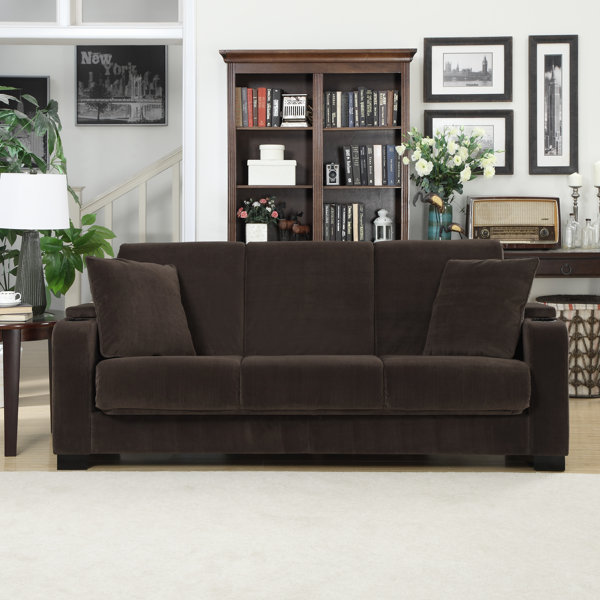 Ciera convertible sleeper sofa near a lamp