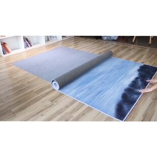 are latex backed rugs safe for laminate floors?