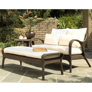 Go to store & view more images Bali Ottoman with Sunbrella Cushions by Woodard
