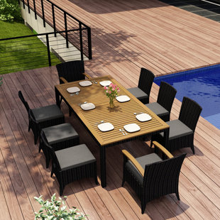 Go to store & view more images Holbrook 9 Piece Teak Dining Set with Sunbrella Cushions by Rosecliff Heights