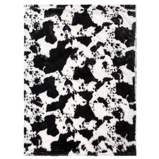 cow print swaddle blanket