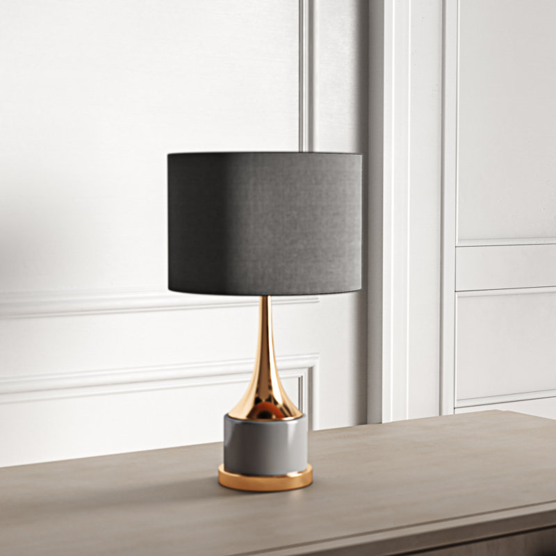 gold and grey table lamp