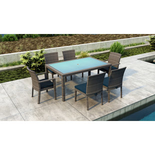 Go to store & view more images Gilleland 7 Piece Dining Set with Sunbrella Cushion by Orren Ellis