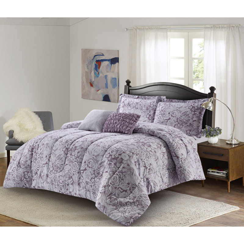 The contrasting pure white and dusty purple. abingdon reversible floral 5 piece comforter set