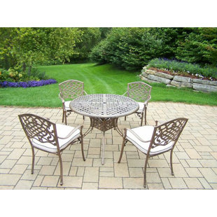 Go to store & view more images Mississippi 5 Piece Dining Set with Cushions by Oakland Living