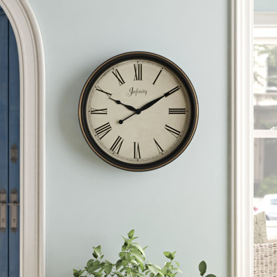 Progreso Wall Clock Three Posts™