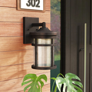 Go to store & view more images Kasey Outdoor Wall Lantern by Latitude Run