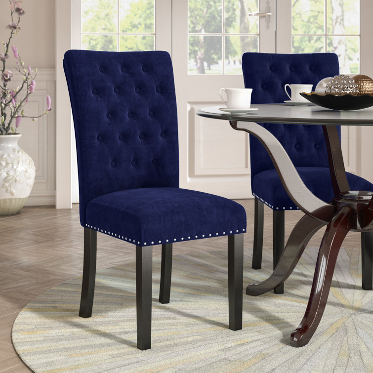 dining table with royal blue chairs