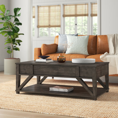Carmesha Solid Wood Lift Top Coffee Table with Storage