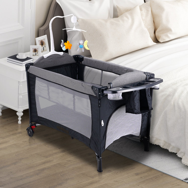 Isabelle Max Portable Baby Crib With Comfortable Mattress Changing Table And Toys Reviews Wayfair