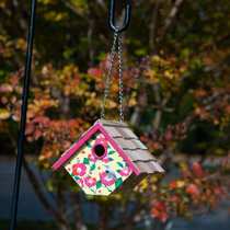 T pot fashioned into a wren birdhouse