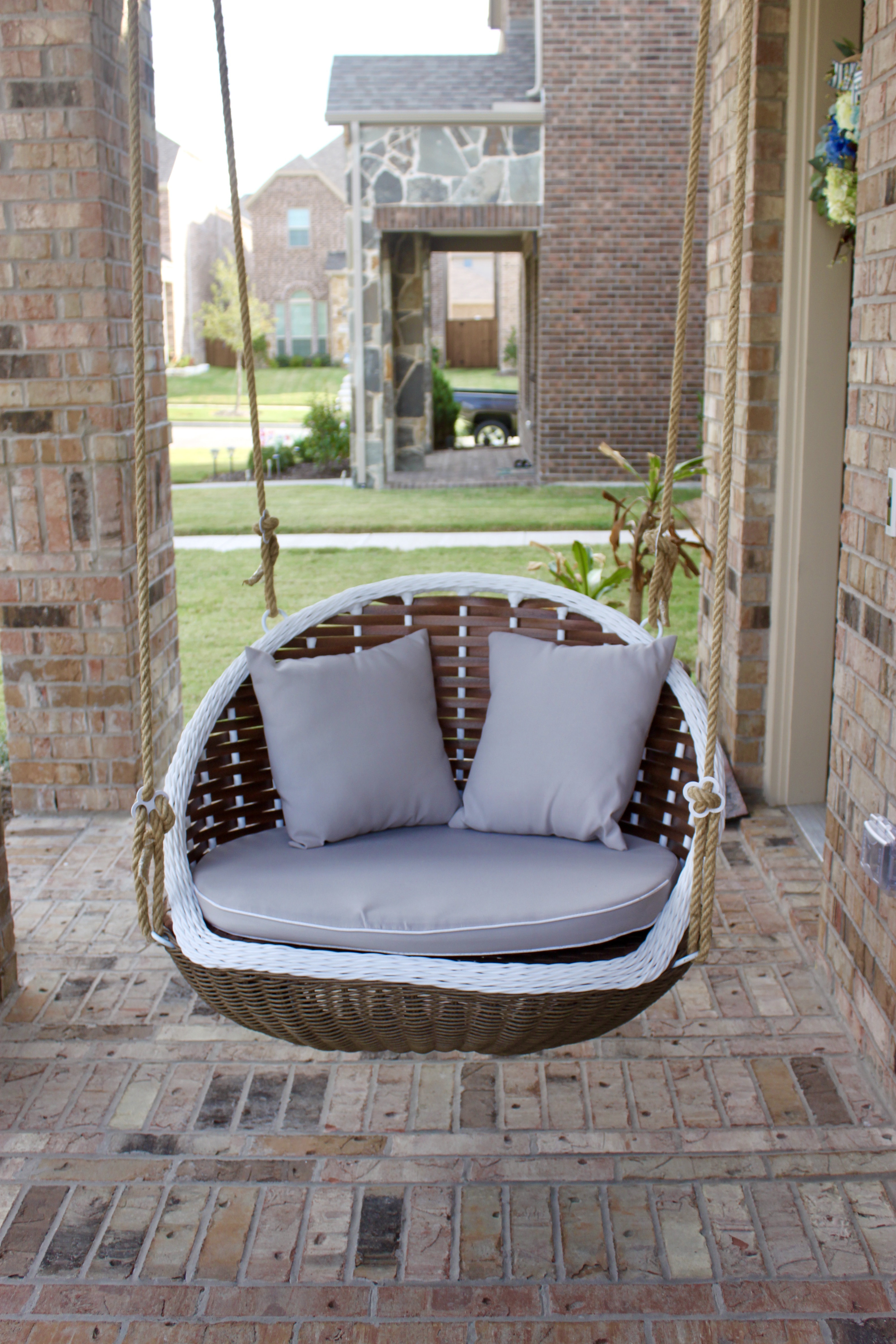 swinging bed for outdoor lounging on Bayou Breeze Albanese Unique Design Porch Swing Reviews Wayfair