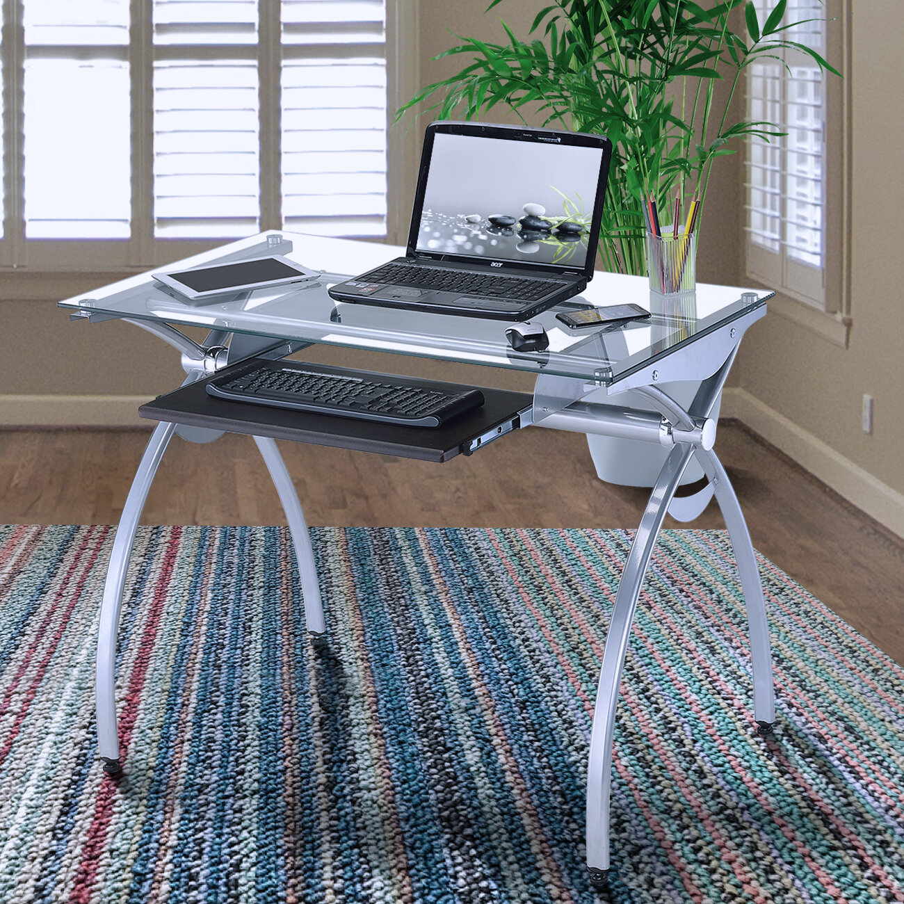 keyboard tray on top of desk