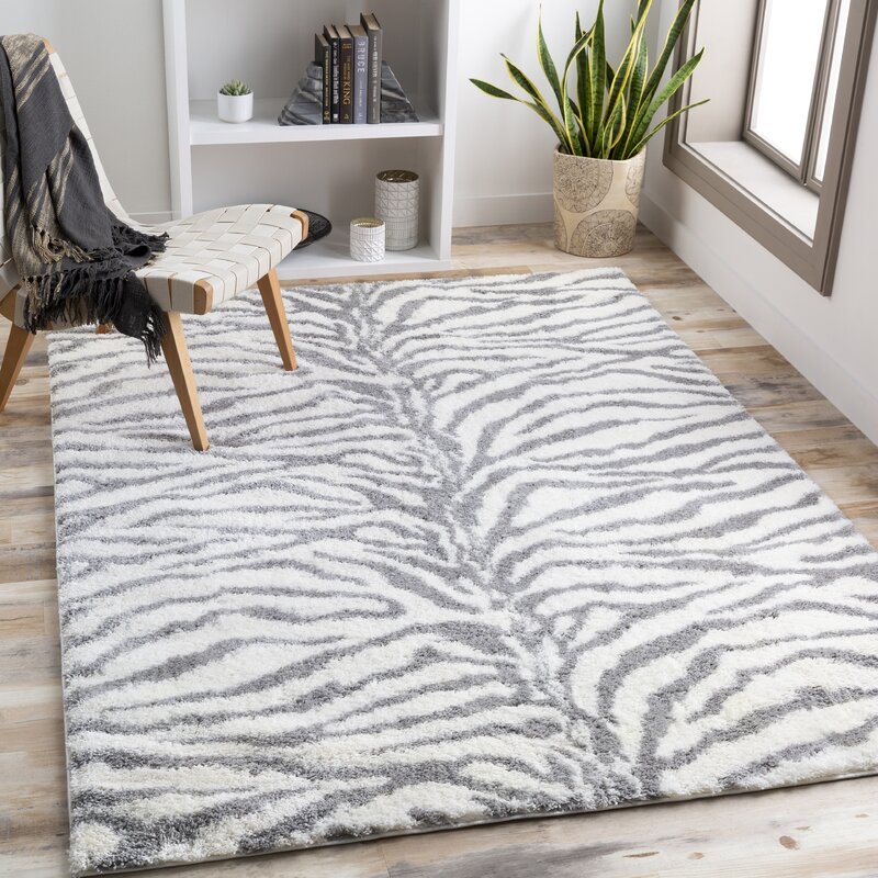 Everly Quinn Animal Print Flatweave Cream, Grey Area Rug & Reviews ...