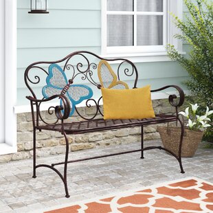 brown metal garden bench