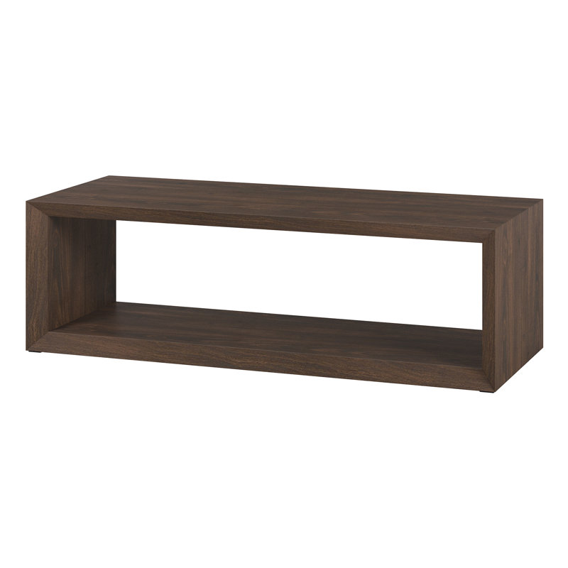 Foxtrot Faux Wood Coffee Table With Shelf Size: 18" H x 58" L x 23.38" W, Color: Black Grain
