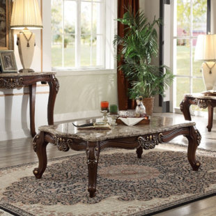 Go to store & view more images Arvilla Traditional Rectangular Wood and Marble Coffee Table by Astoria Grand