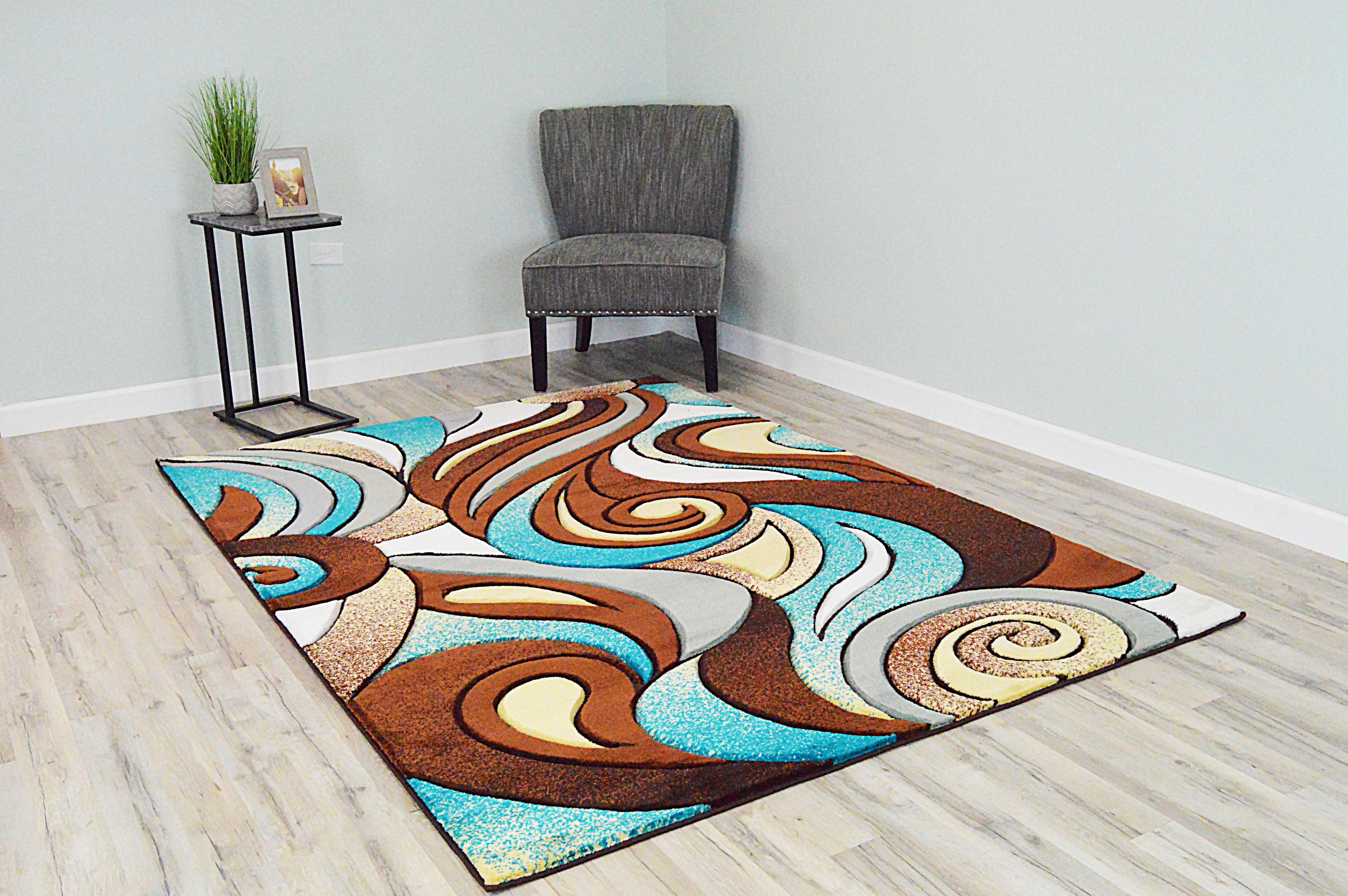 Ivy Bronx Mccampbell Hand Carved Abstract Brown Blue Area Rug Ivy Bronx Mccampbell Hand Carved