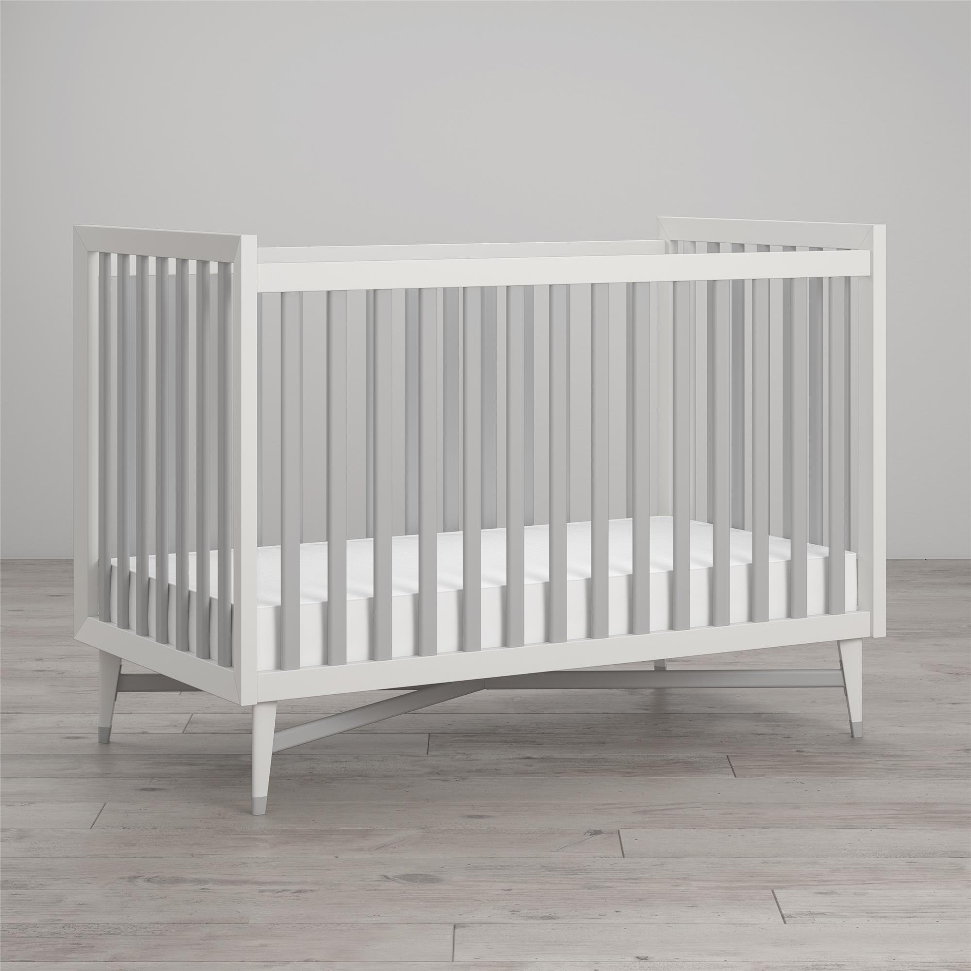 white and wood nursery furniture