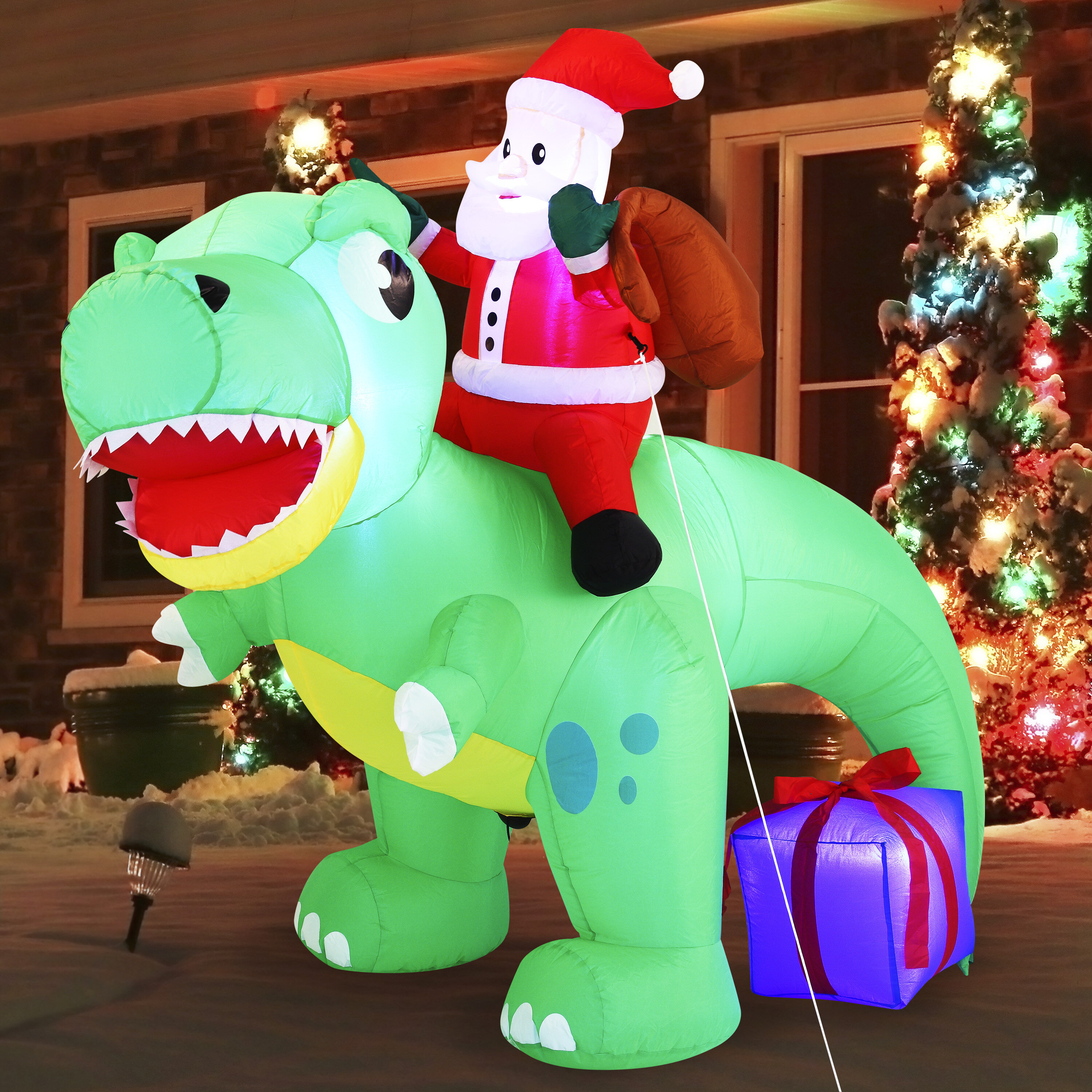 The Holiday Aisle® Santa Riding A Dinosaur Inflatable Wayfair