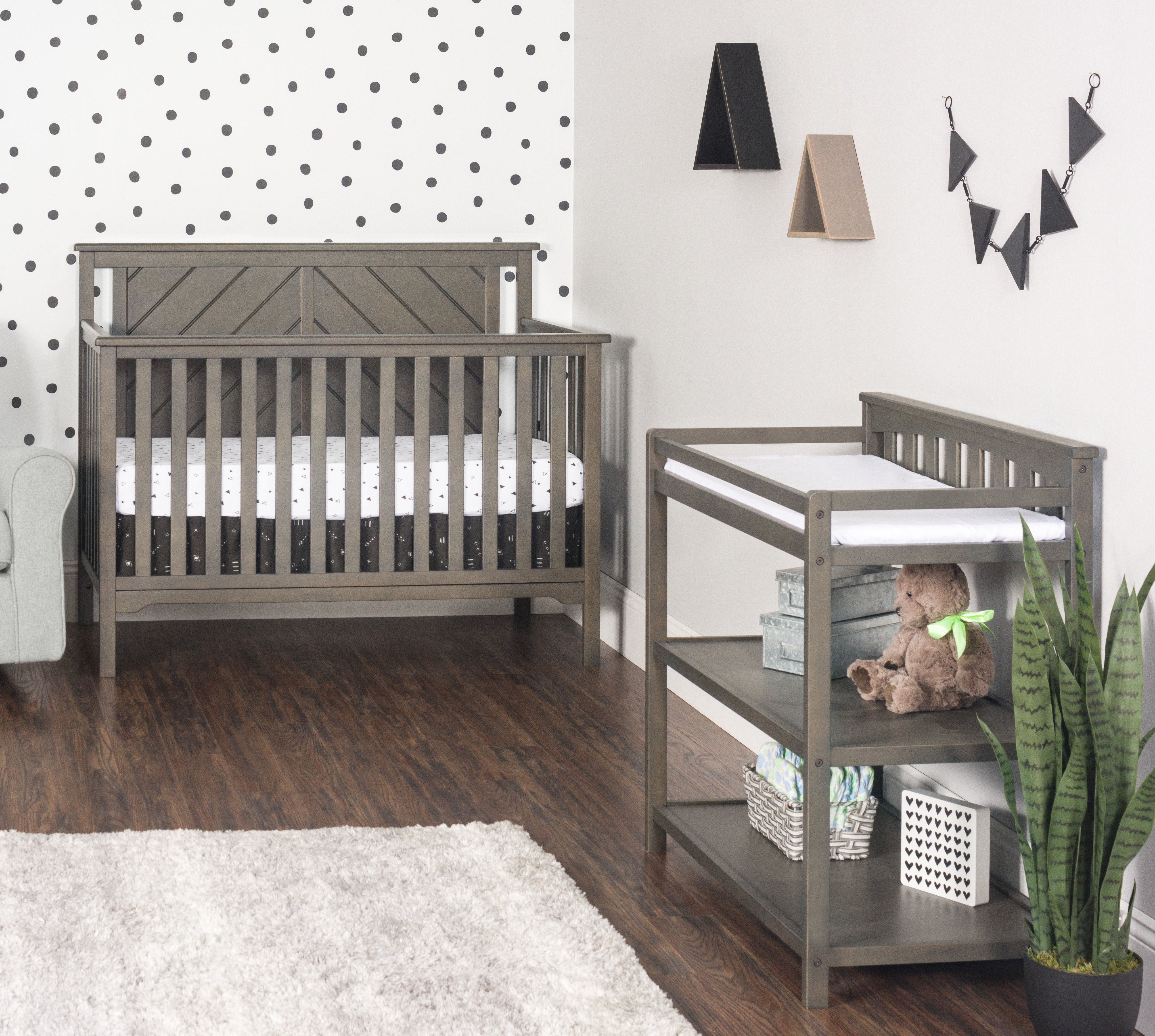 nursery with gray furniture