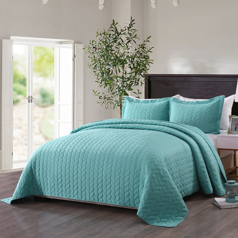 teal colored quilts