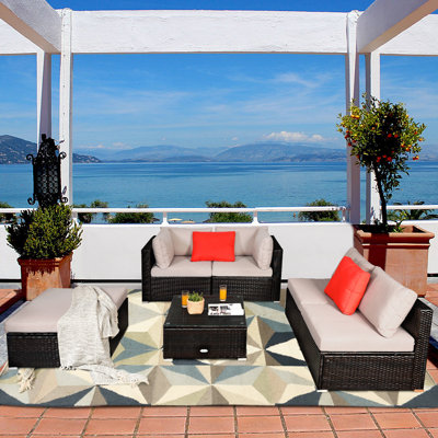 Planada 6 Piece Rattan Sectional Seating Group with Cushions