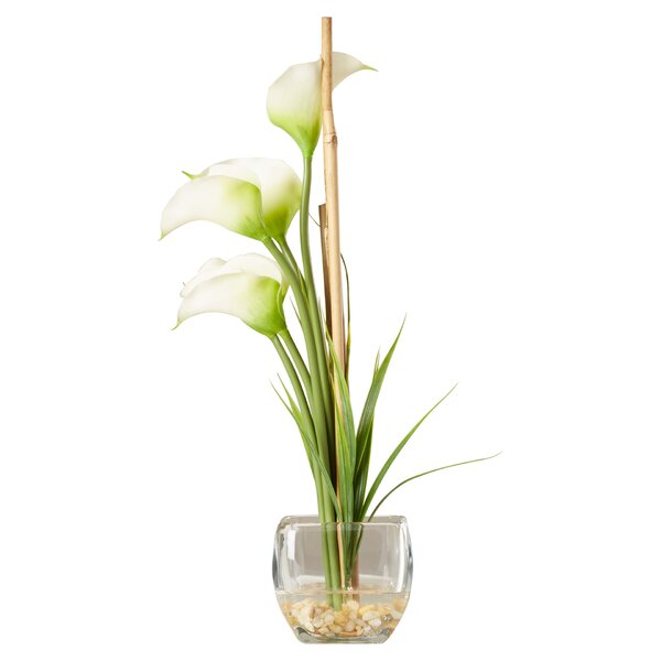 fake lilies in vase