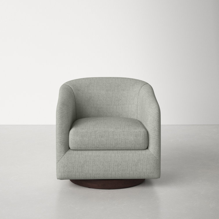 gray upholstered swivel chair