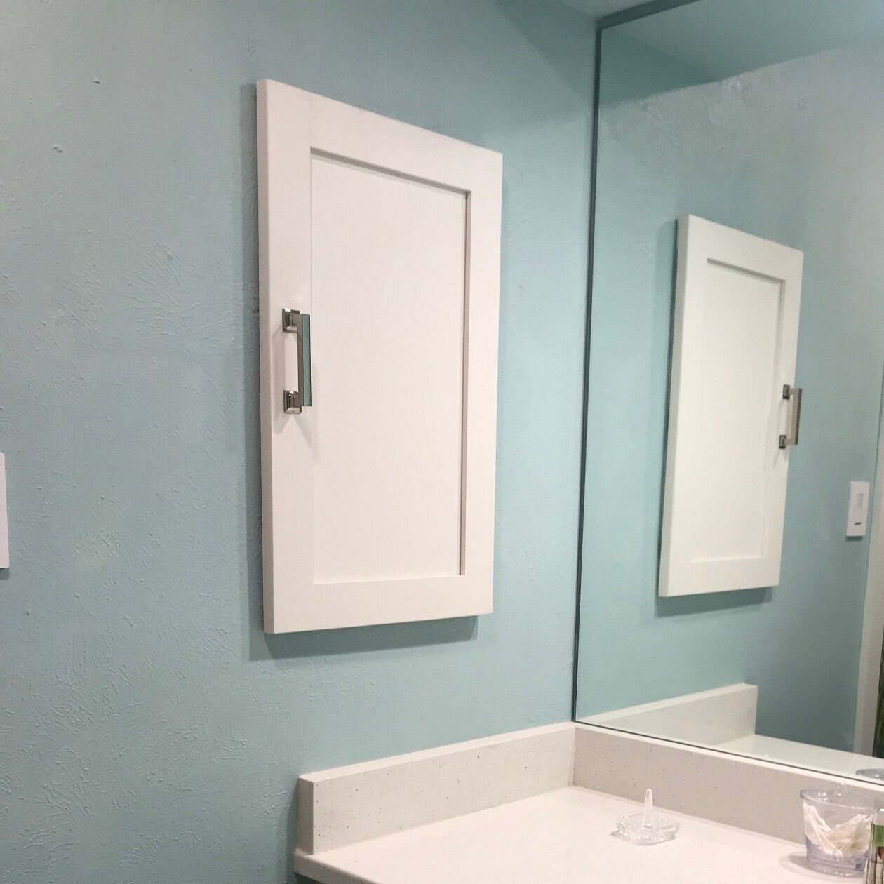 bathroom cabinet recessed in wall