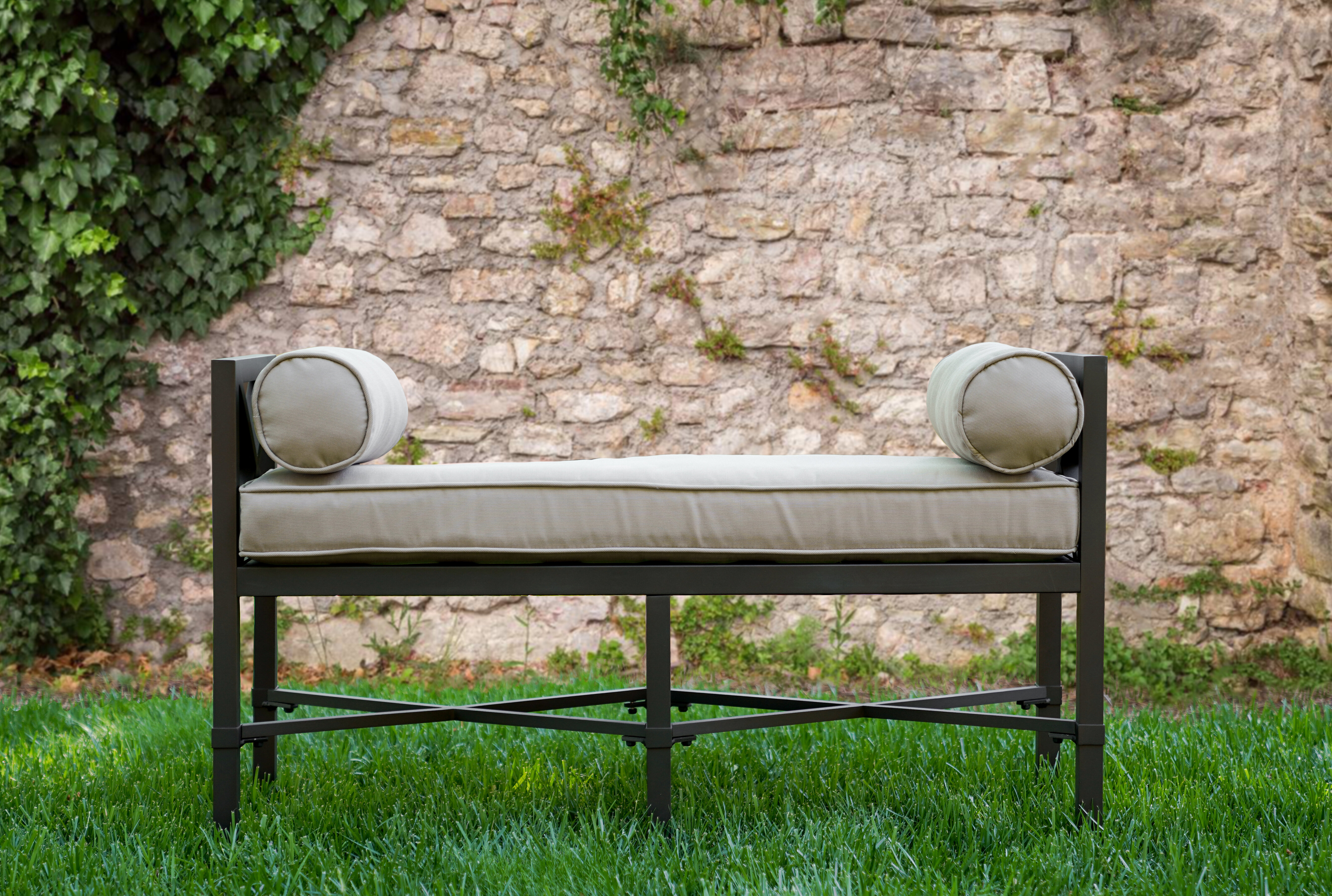 metal outdoor bench with cushion