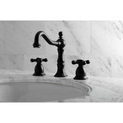Kingston Brass Heritage Two-Handle 3-Hole Deck Mount Widespread Bathroom Faucet with Brass Pop-Up Drain