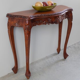 Wilder Hand Carved Wood Console Table By Astoria Grand