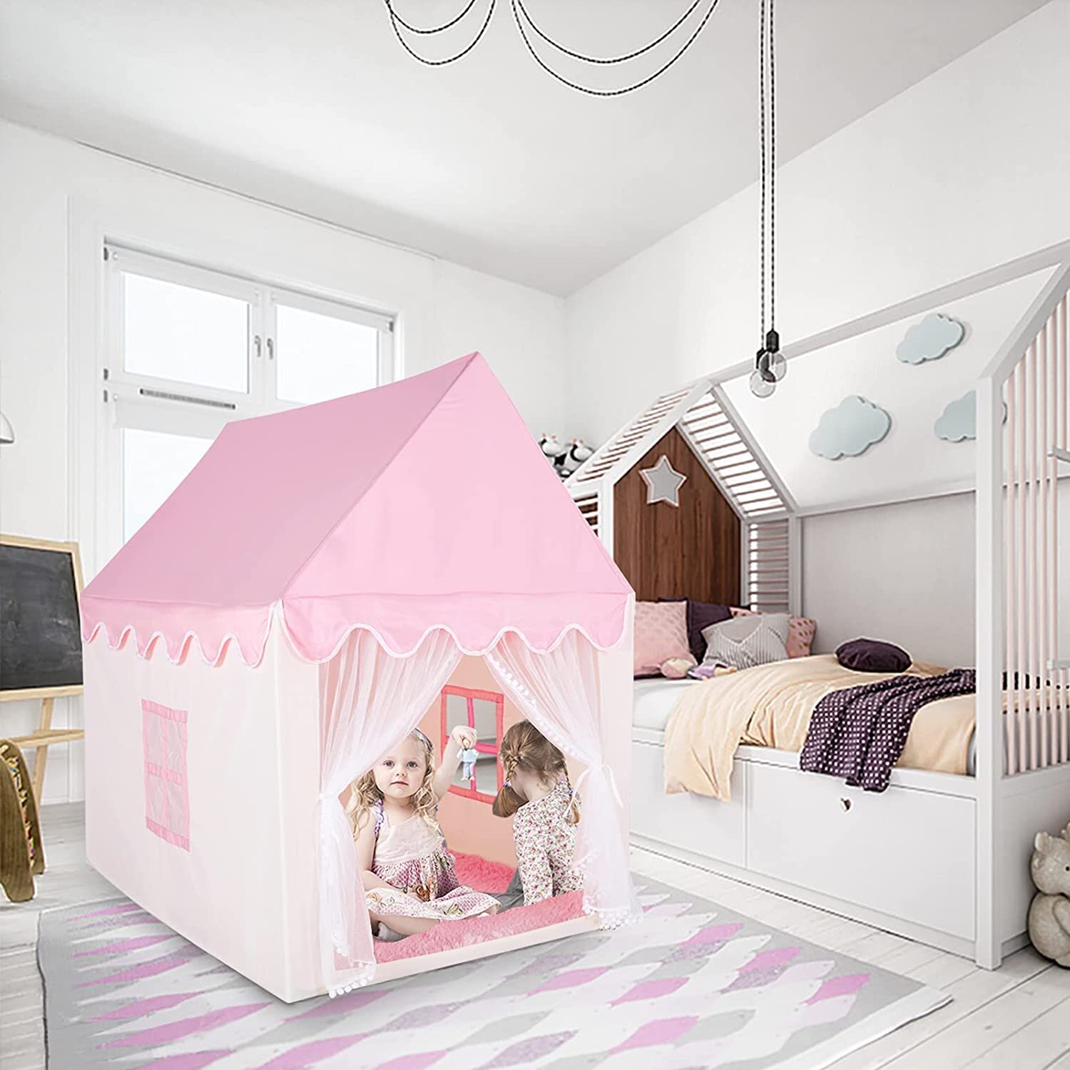 pink playhouse with kitchen