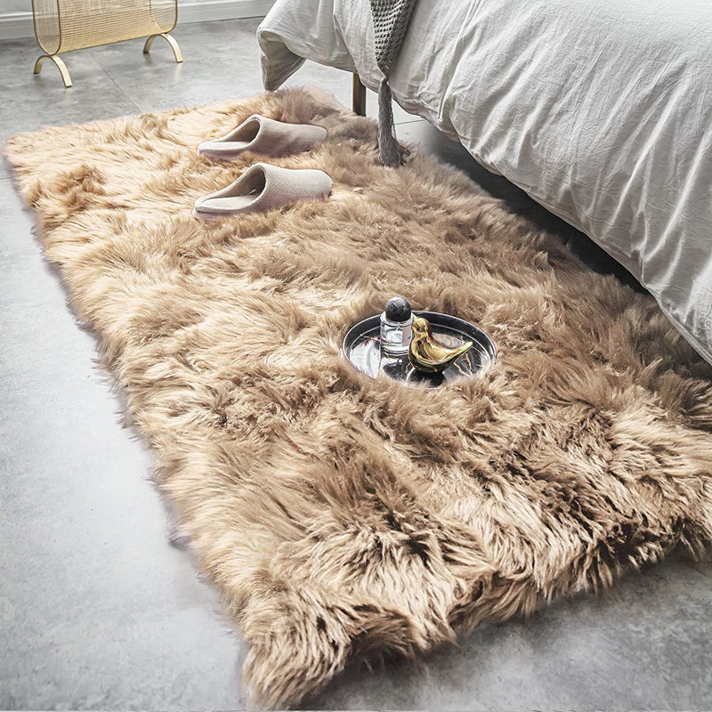Malaiah Shag Faux Sheepskin Fur Area Rug in Beige Rug Size: Rectangle 2' x 3'