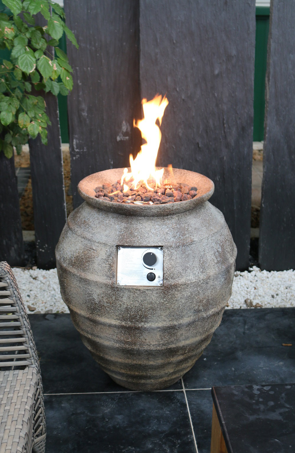 outdoor dining table with fire pit in the middle on Red Barrel Studio Preble 26 H X 23 W Concrete Propane Outdoor Fire Column Wayfair