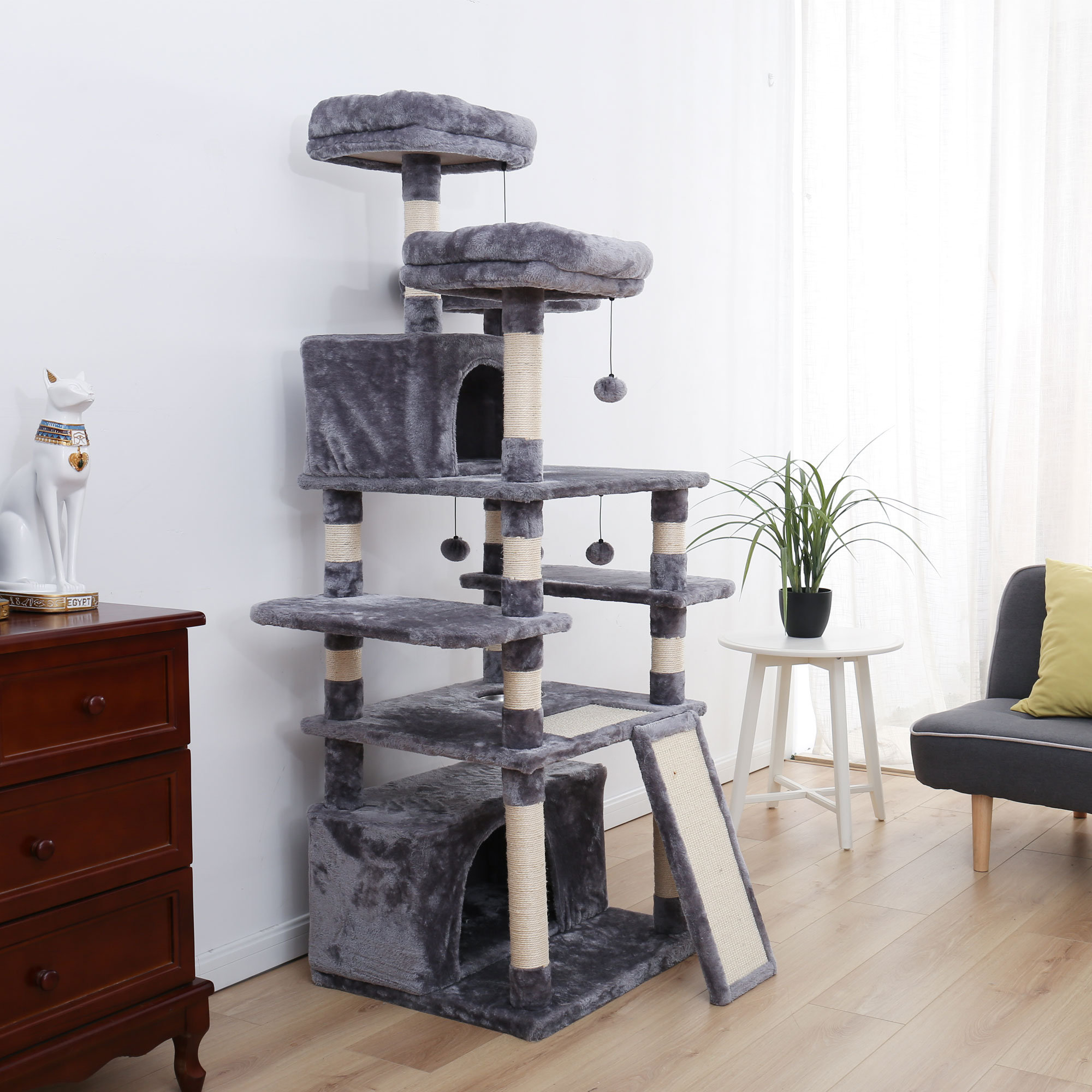 cat tree with food bowl