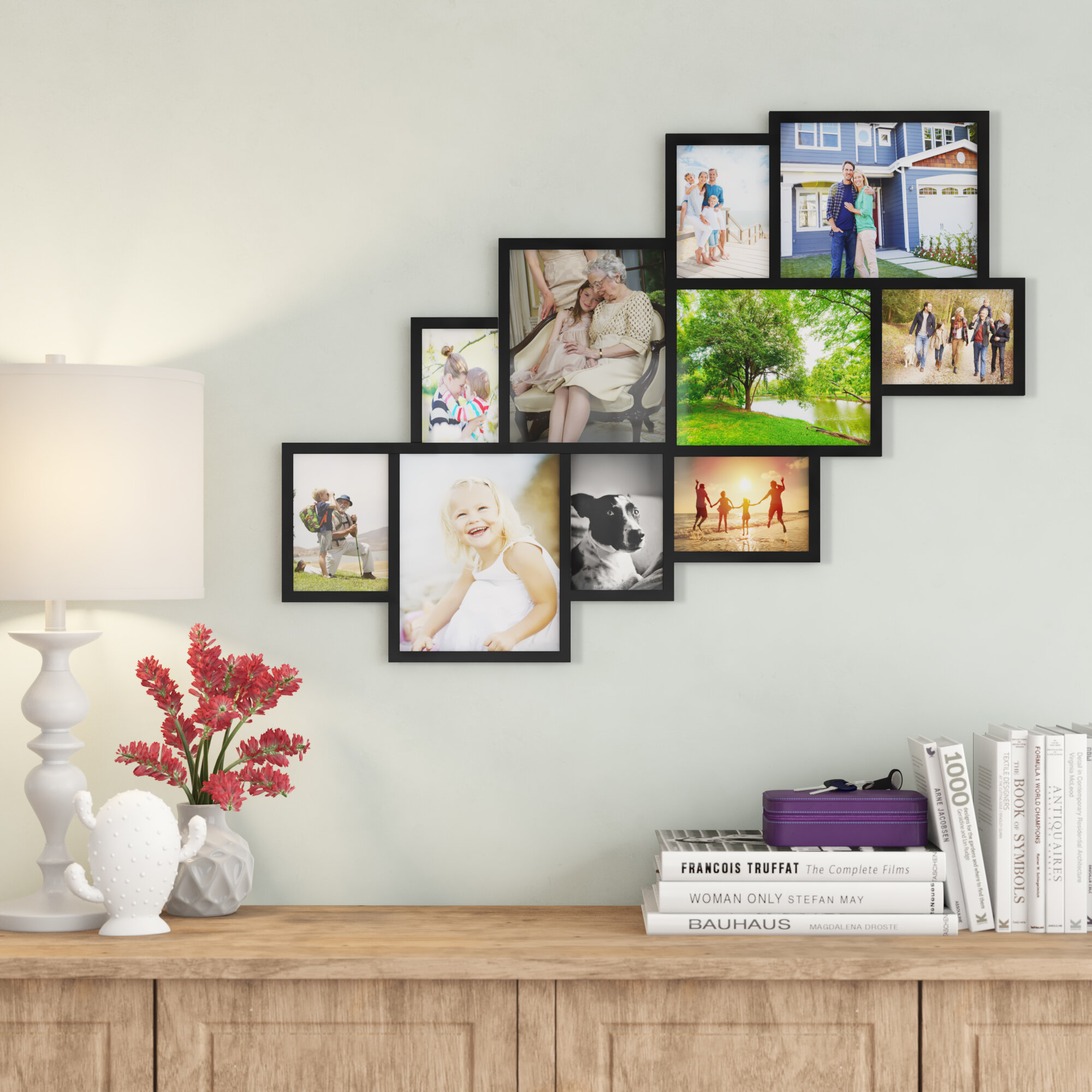 hanging framed photos on a wall