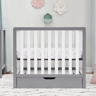 small crib with storage